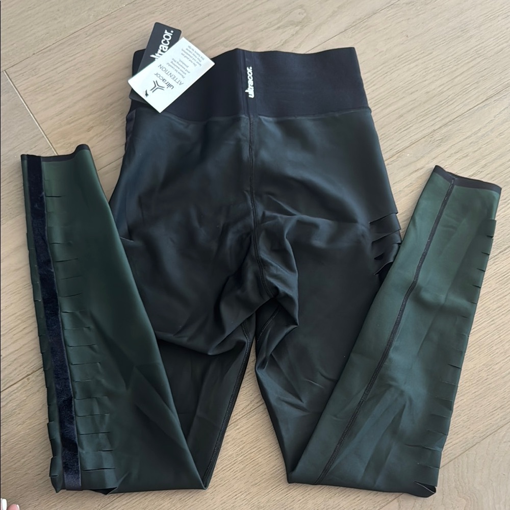 Ultra core, high waisted Black and Green Leggings with cut out up side